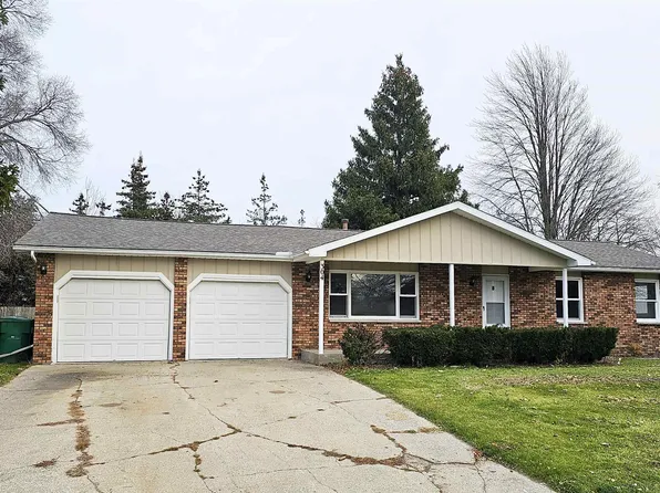 304 Widmer Ct, Auburn, MI 48611