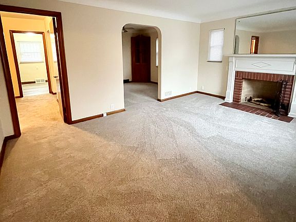 Livingroom, front entrance view.