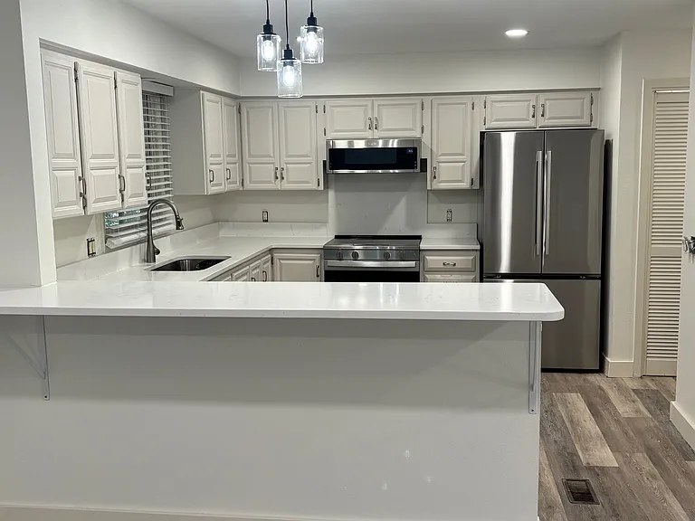 Gorgeous kitchen with oversized breakfast bar