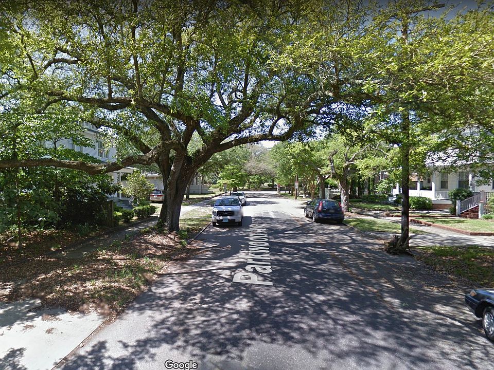Lot to left of tree