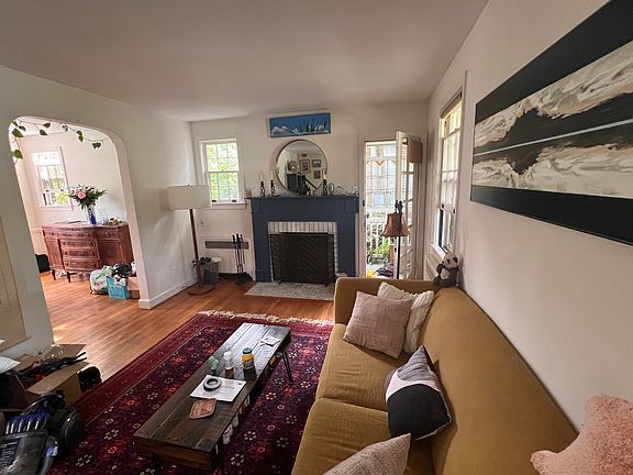 Living room - alternate view. Renovated fireplace.
