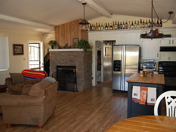 Living room facing fireplace