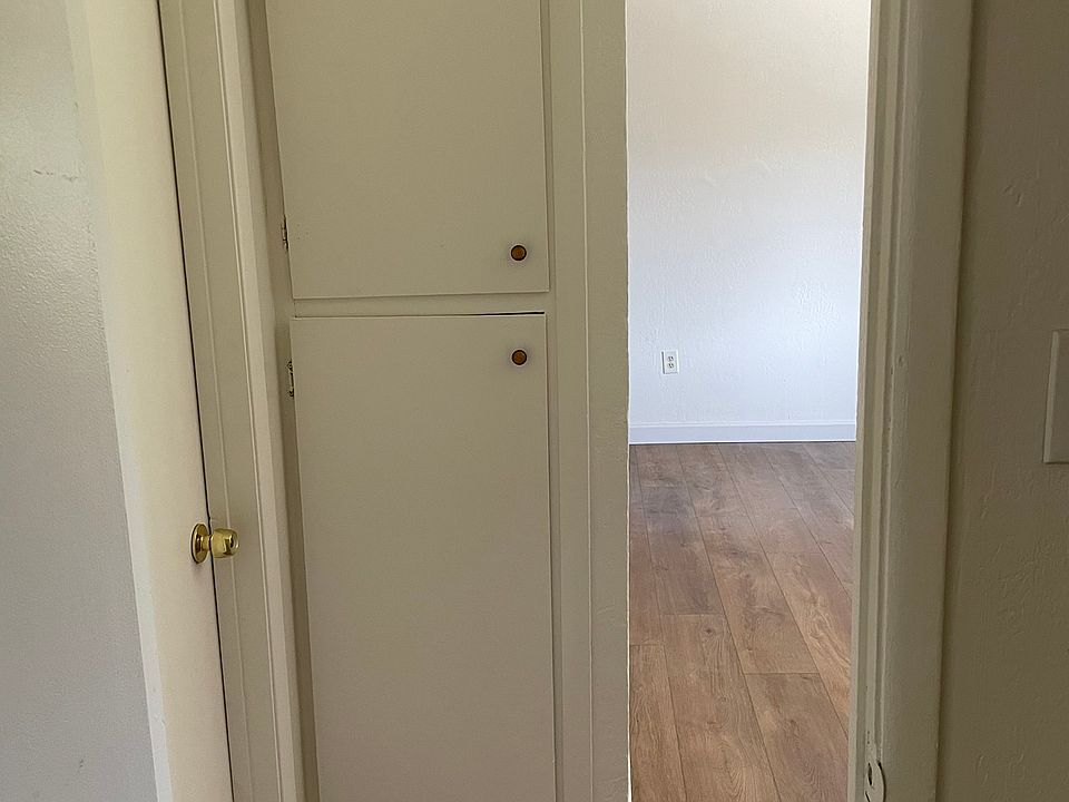 Storage cabinets adjacent to bath
