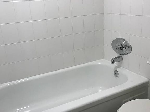 Experience a sleek and serene bathroom space with elegant fixtures. Experience a sleek and serene bathroom space with elegant fixtures.