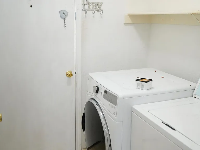 Utility room with Washer and Dryer included.