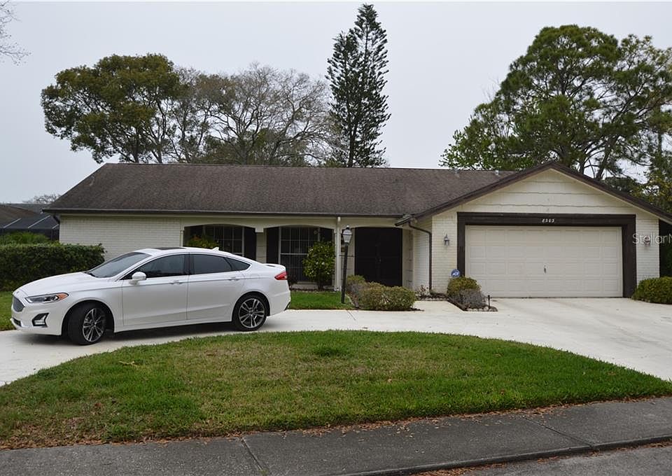 1st image of 8303 Woodsong Row