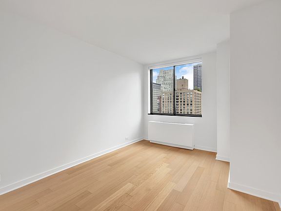 5th image of 124 W 60th St APT 21N