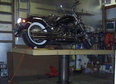 shop has hydrolic lift for cars or motorcycles