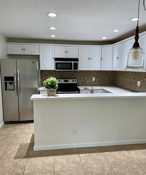 Dining area view 2 and kitchen view