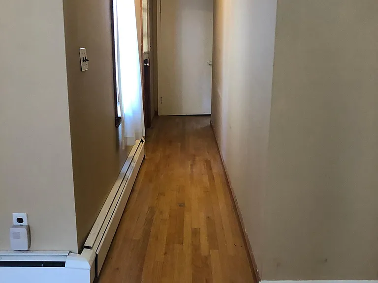 Hallway to kitchen and master bath