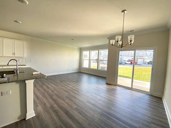 Overlooking living room and dining area. Patio off dining area.