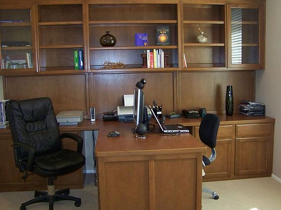 Den/Office with custom built-in double desk and book shelves