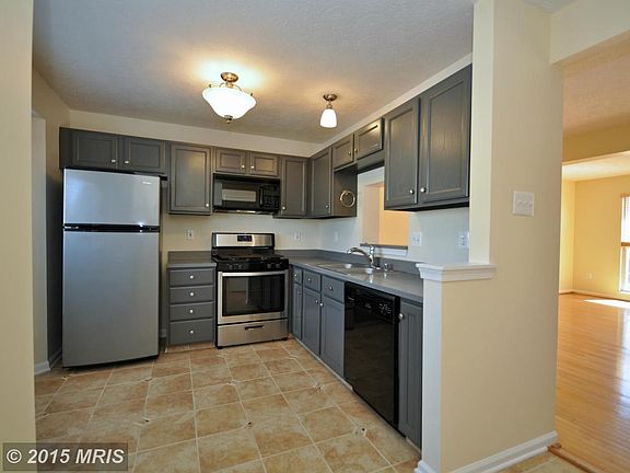 Kitchen with Brand New Gas Range and New Refrig
