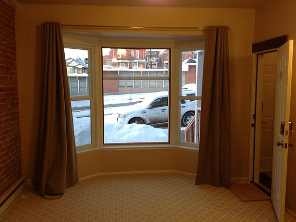 A Private Entrance Opens into the Large Living Room with Ins