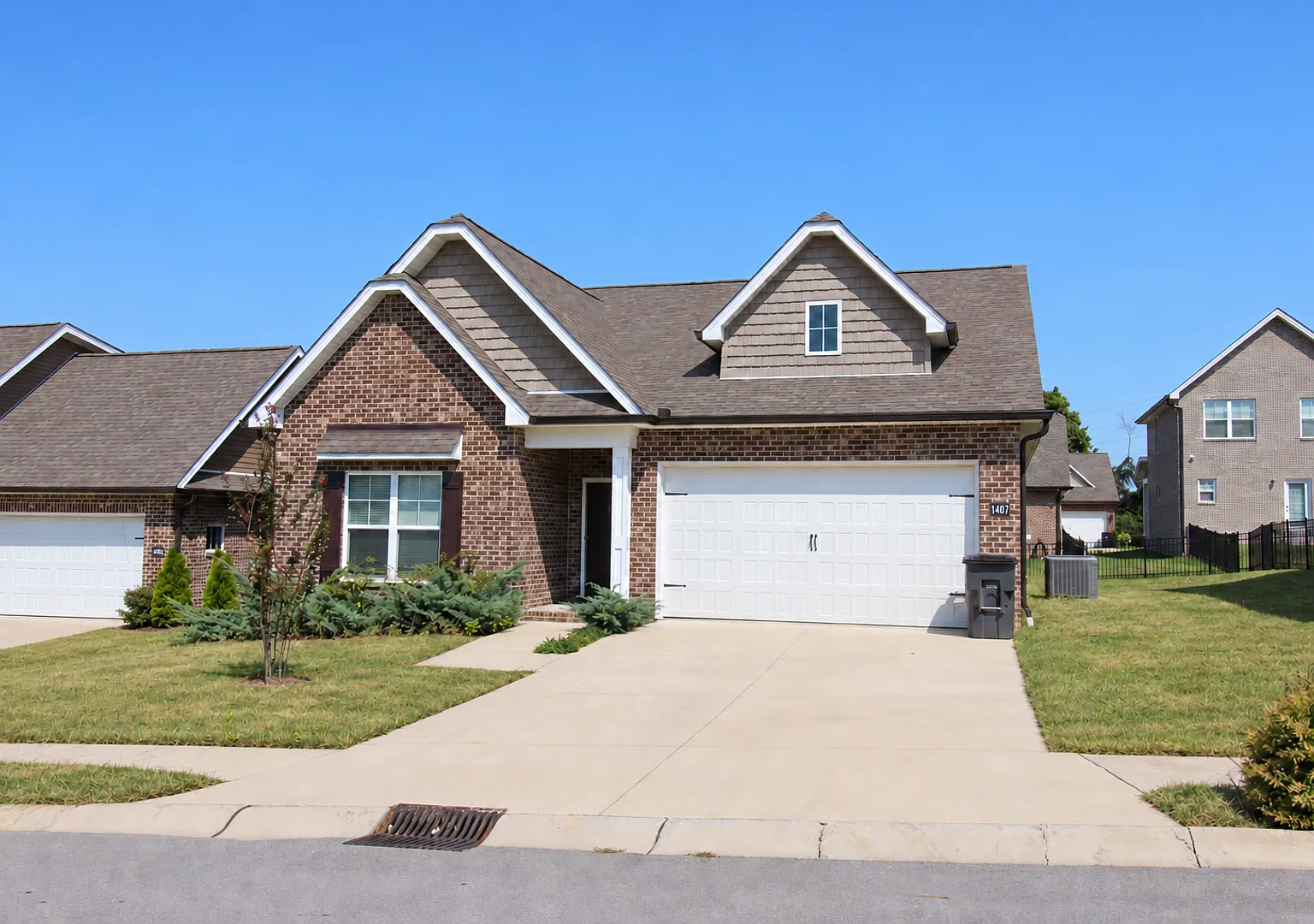 Open-Concept 3-Bedroom Home with a Fenced Backyard & Covered Patio — Photo 1