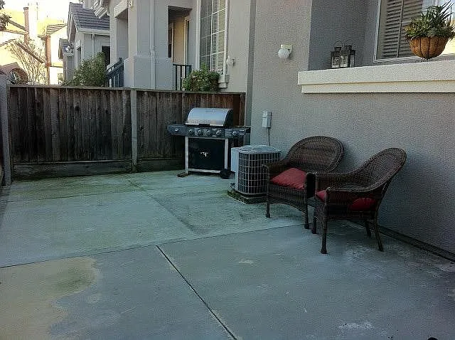 Fenced Frontyard with low maintenance concrete flooring