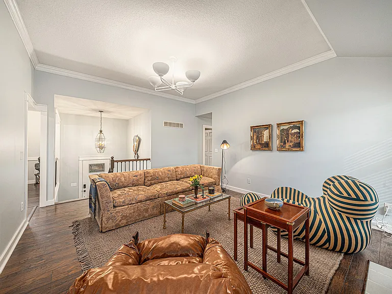 A cozy lounge with plush seating, warm tones, and soft lighting_perfect for relaxing, chatting, or unwinding after a day outdoors.