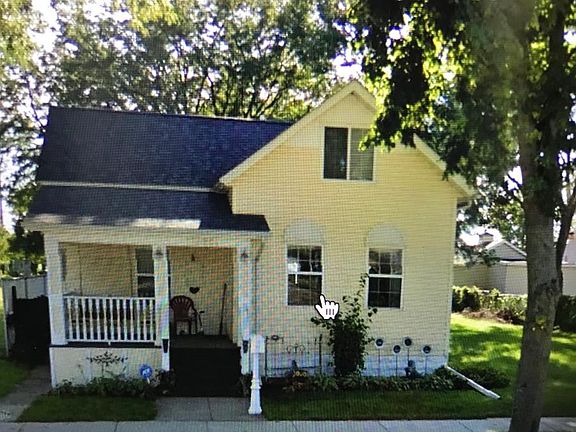 front of house - porch and swing