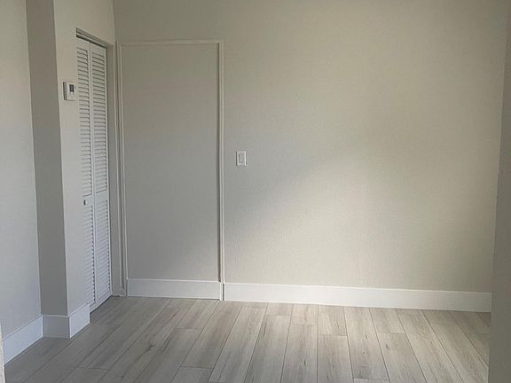 This is the bedroom - AC closet is on the far left of the picture - this 1/1 has its own AC panel for thermostat adjustments