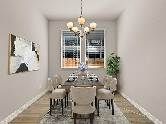 Gather your family and guests together in your formal dining room featuring gorgeous flooring, large