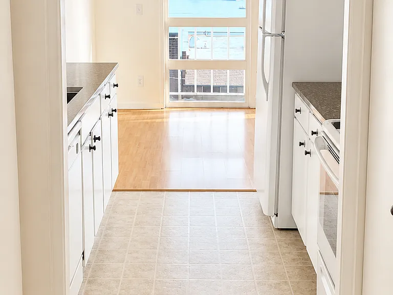 Kitchen and coat closet and extra storage shelves