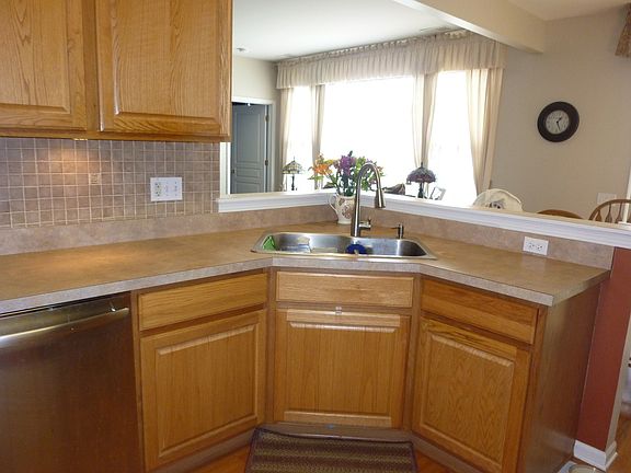 Kitchen open to breakfast room and living room