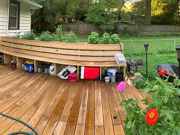 Large back deck with flower boxes on backside