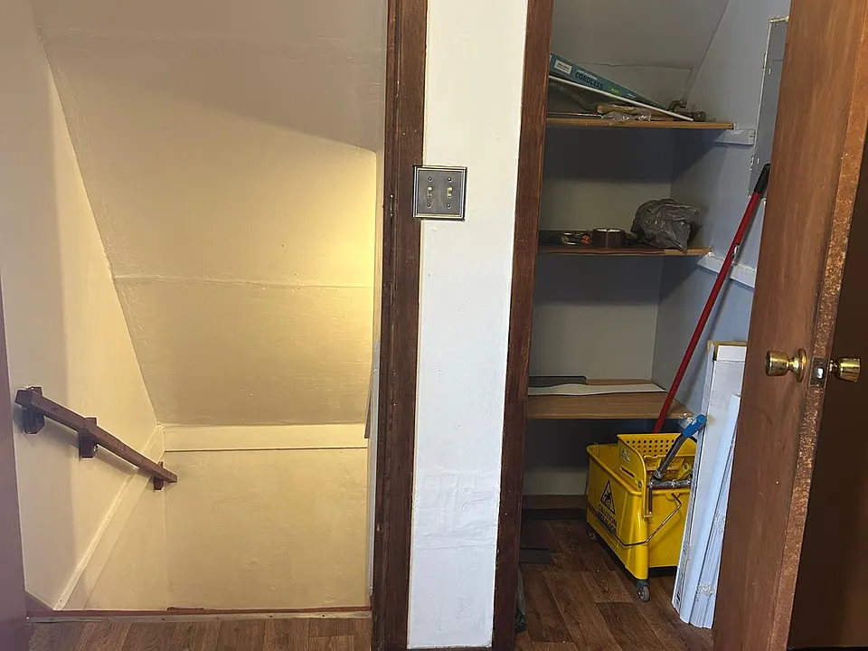 Kitchen pantry and primary entry point.