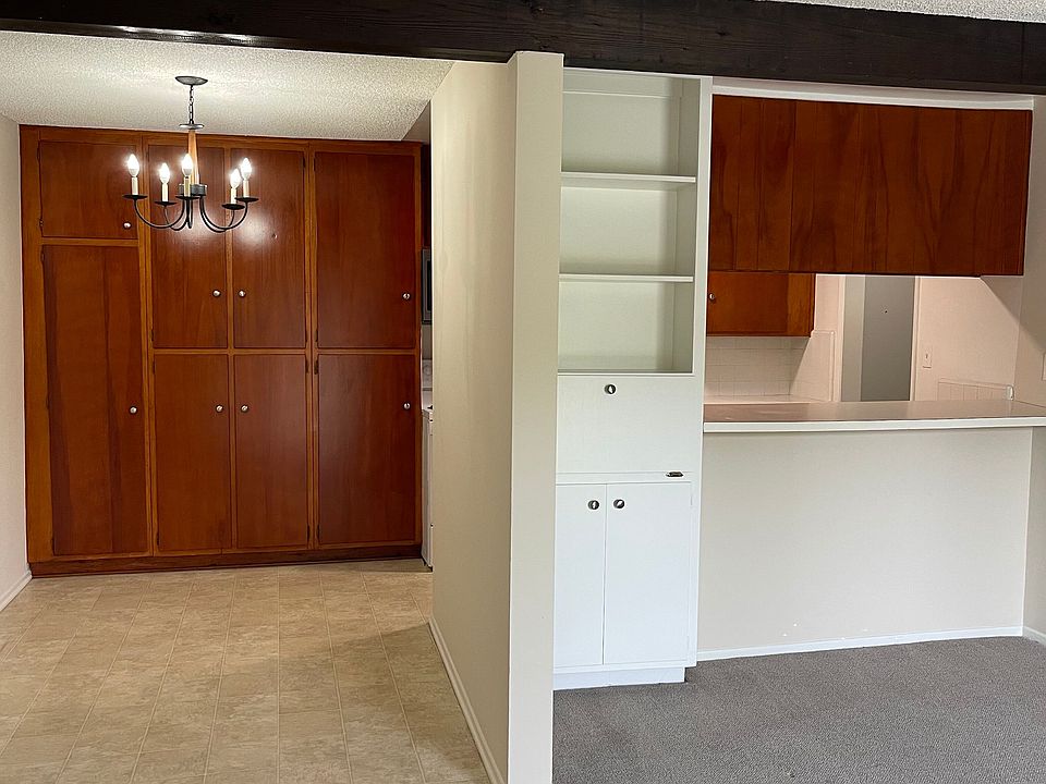 Dining area/cabinets, breakfast bar from living room