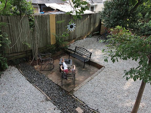 View from Unit 3 - Looking left and down at the relaxing firepit area. Good thing there's no fire as my feet would be roasted.