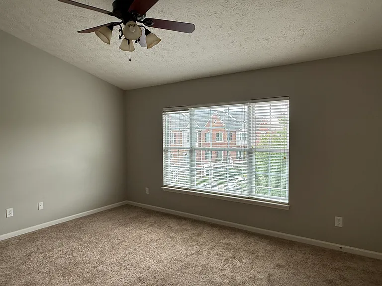 The third and main bedroom upstairs with walk-in closet and en suite bathroom.