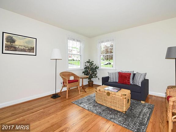 Views of living room w/neutral decor