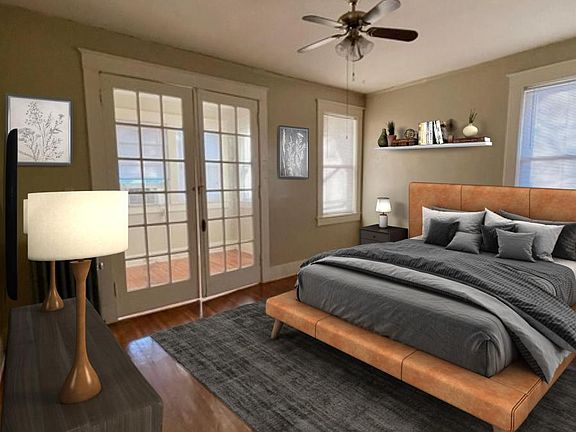 Large bedroom with french doors leading to office or bonus space