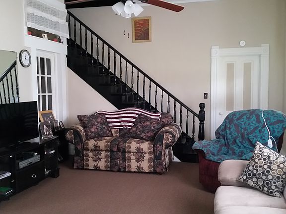 living room and stair case