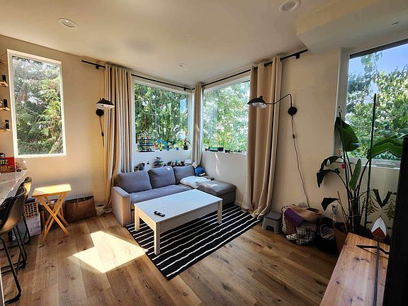 living room gets great natural light during the day. This floor also has a half bath, perfect for guests.