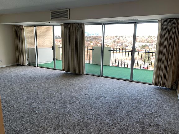 Living room 24ft long with two entrances to the balcony