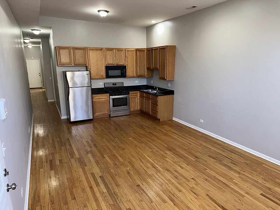 1st image of 2438 N Laramie Ave #1N