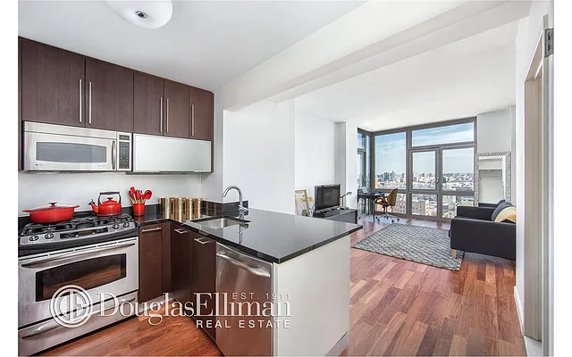 Sold by Douglas Elliman | media 13