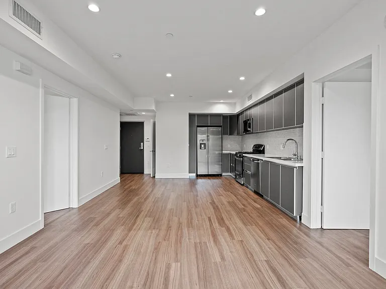 Open-Concept Kitchen, Dining, and Living Room Areas