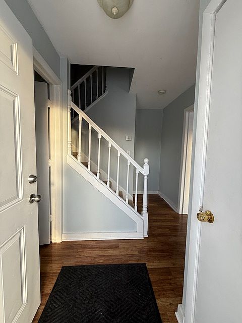 First look from front door. Half bath on the left, living room to the right.