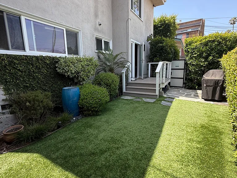 Large private yard off bedroom and dining room