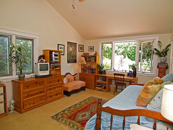 Guest Bedroom with Vaulted Ceilings