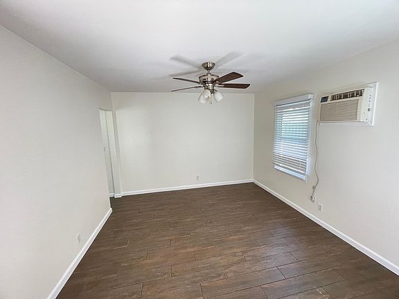 Studio has a/c and heat wall unit and ceiling fan