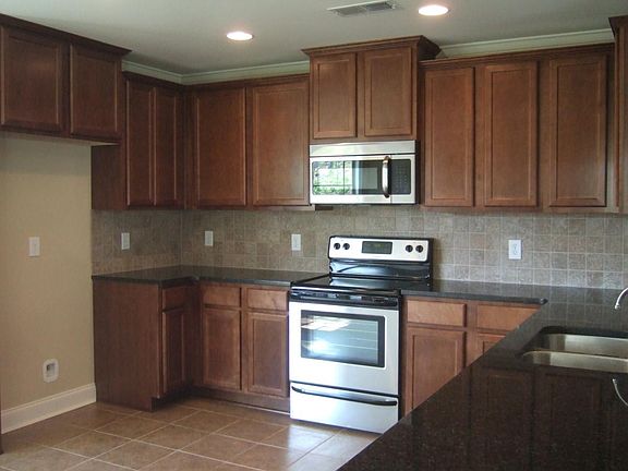 All stainless steel appliances in kitchen (fridge not shown)