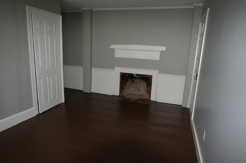 Bedroom with closet. Please note that the fireplace is NOT operational.