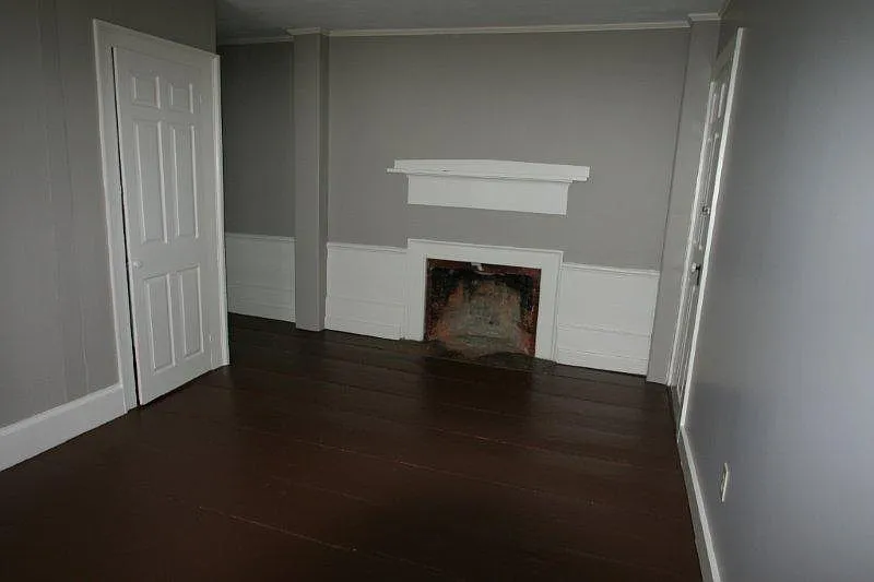 Bedroom with closet. Please note that the fireplace is NOT operational.