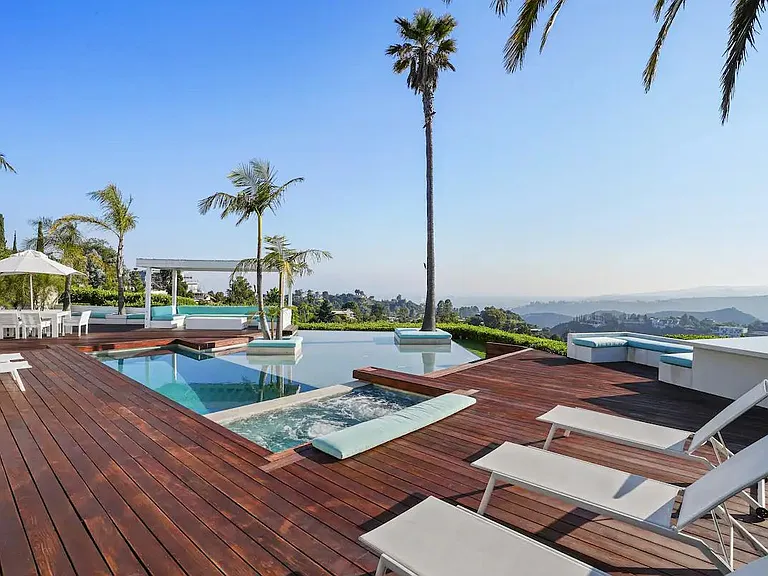The outdoor deck immerses you in nature's embrace, inviting you to connect with the natural beauty that surrounds you.