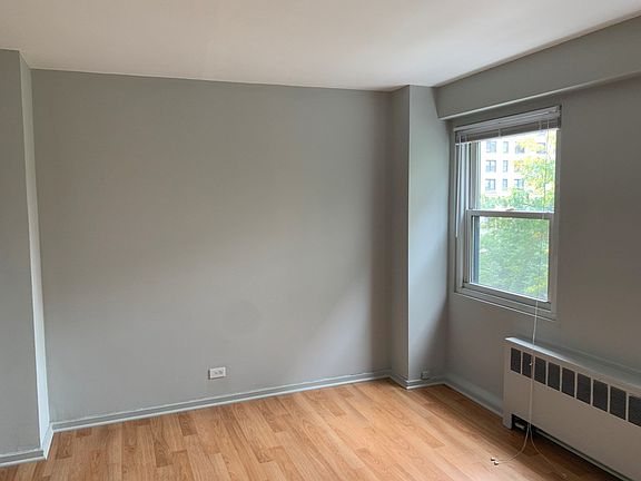 Bedroom larger enough for a queen or king bed.