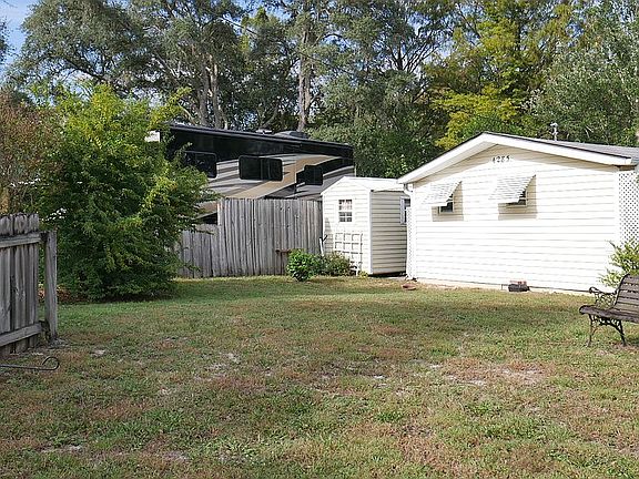 Left Side- Entering Driveway