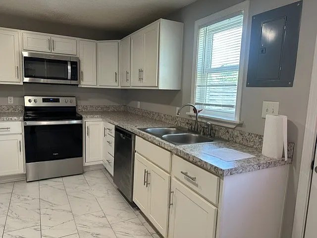 3 bed, 1240 sqft, $1,400 — Photo 4